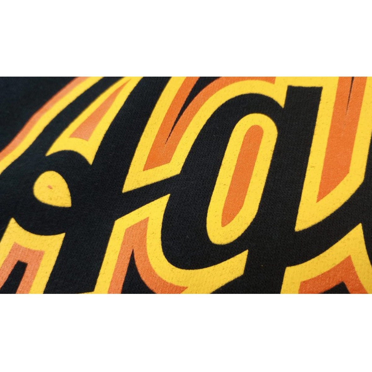 Aguilas Cibaeñas Cursive letters and Black Hooded